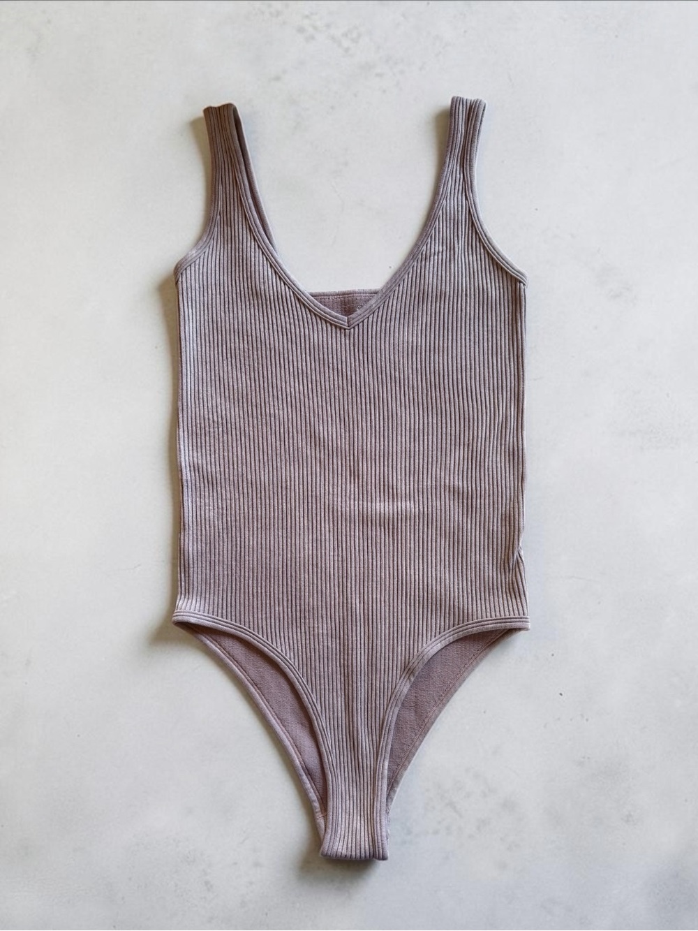 Aura Ribbed One-Piece Bodysuit in Mauve